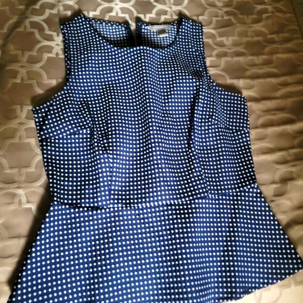 Peplum blue and white polka dot sleeveless blouse